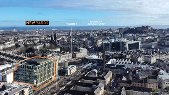 Aerial view of Haymarket in Edinburgh with New Yards building, the tram stop and train station highlighted