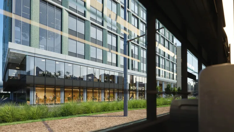 Street view rendering of the new New Yards Haymarket office building from train 